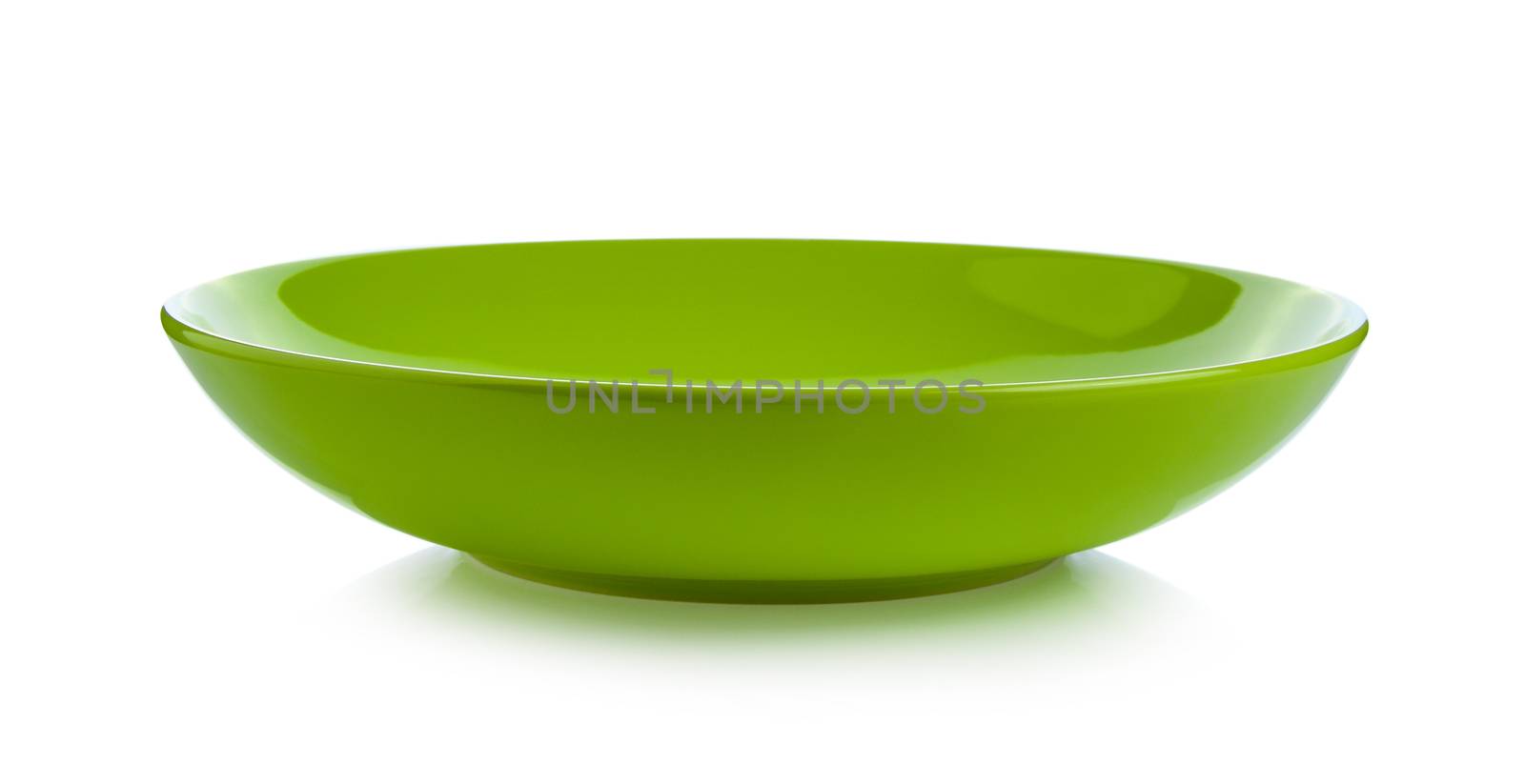 ceramic green plate isolated on white background by sommai