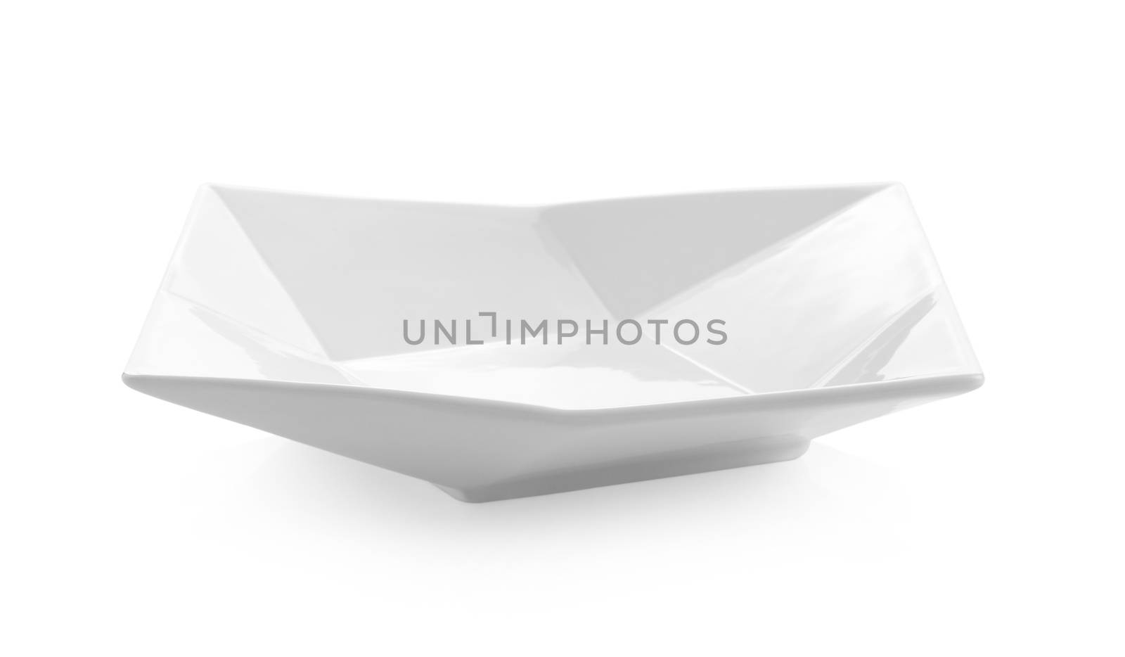 white dish on white background by sommai