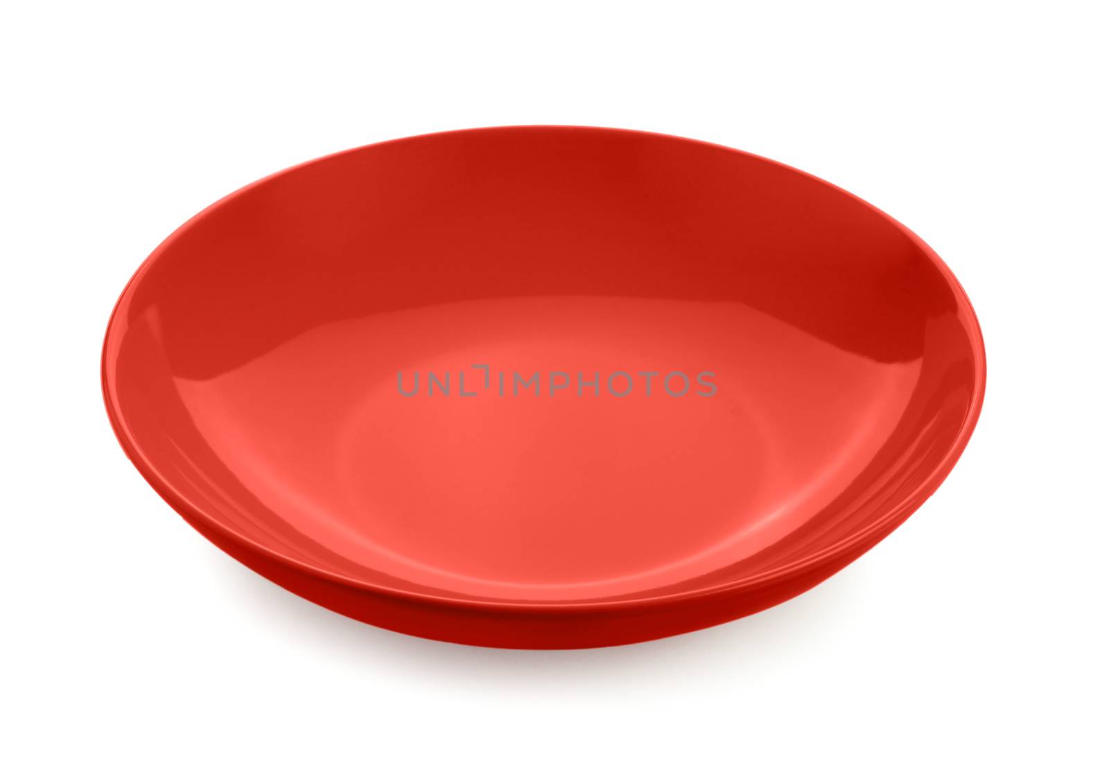 empty red plate isolated on white background by sommai