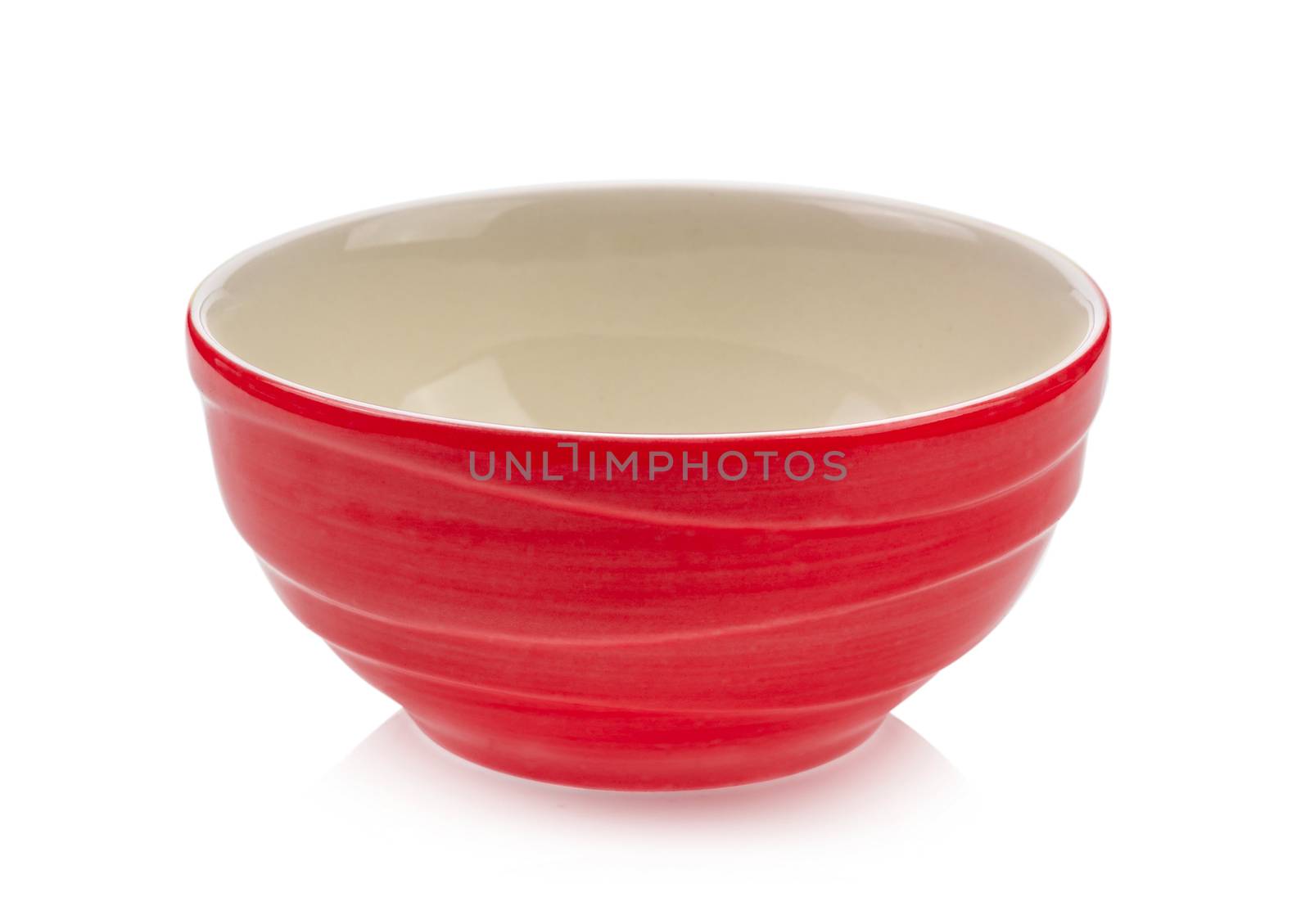 red bowl on white background by sommai