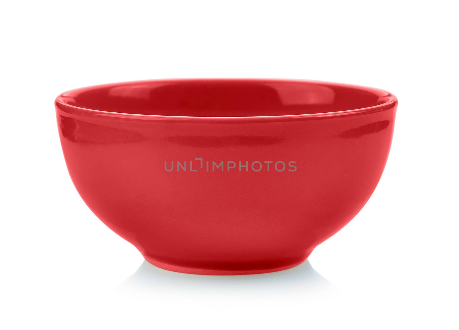 red bowl on white background by sommai