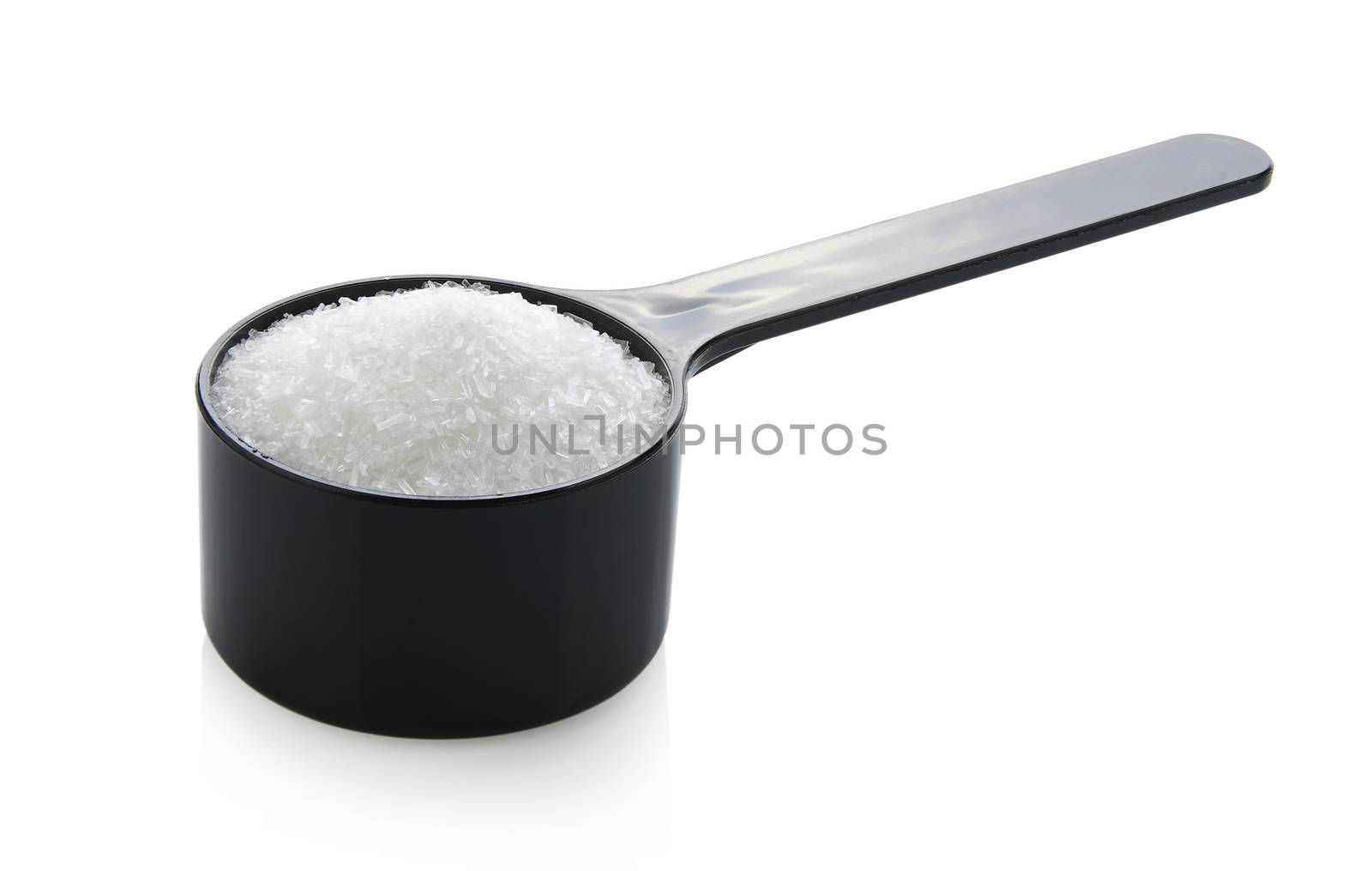 monosodium glutamate in spoon on white background by sommai