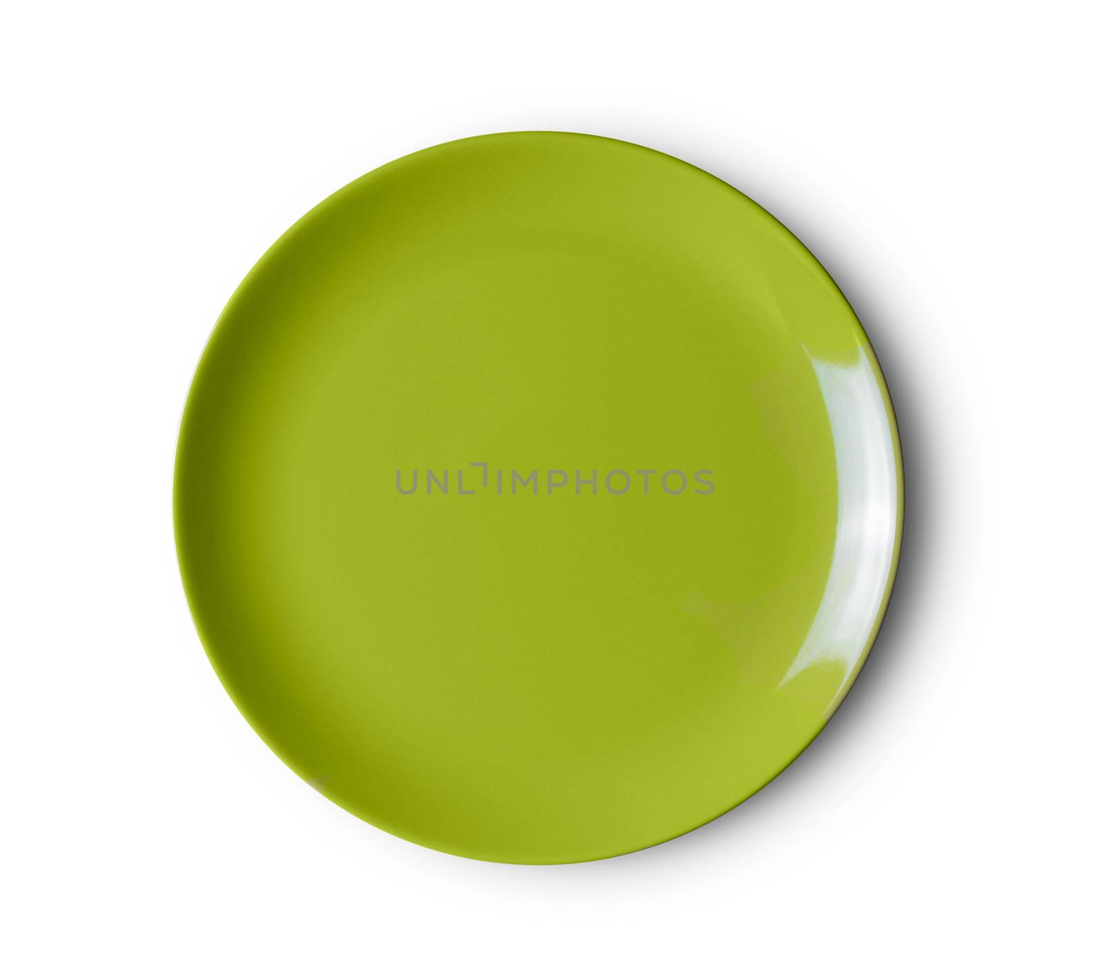 green plate on white background. top view by sommai