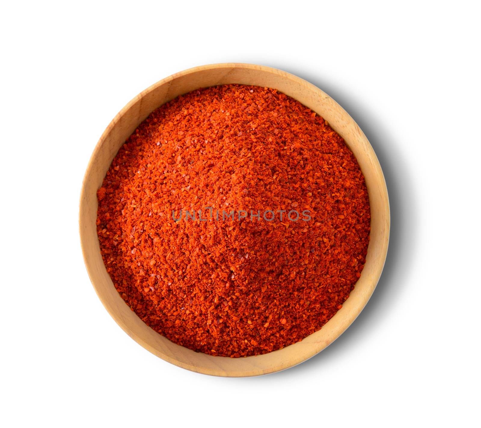powder pepper in wood bowl on white background