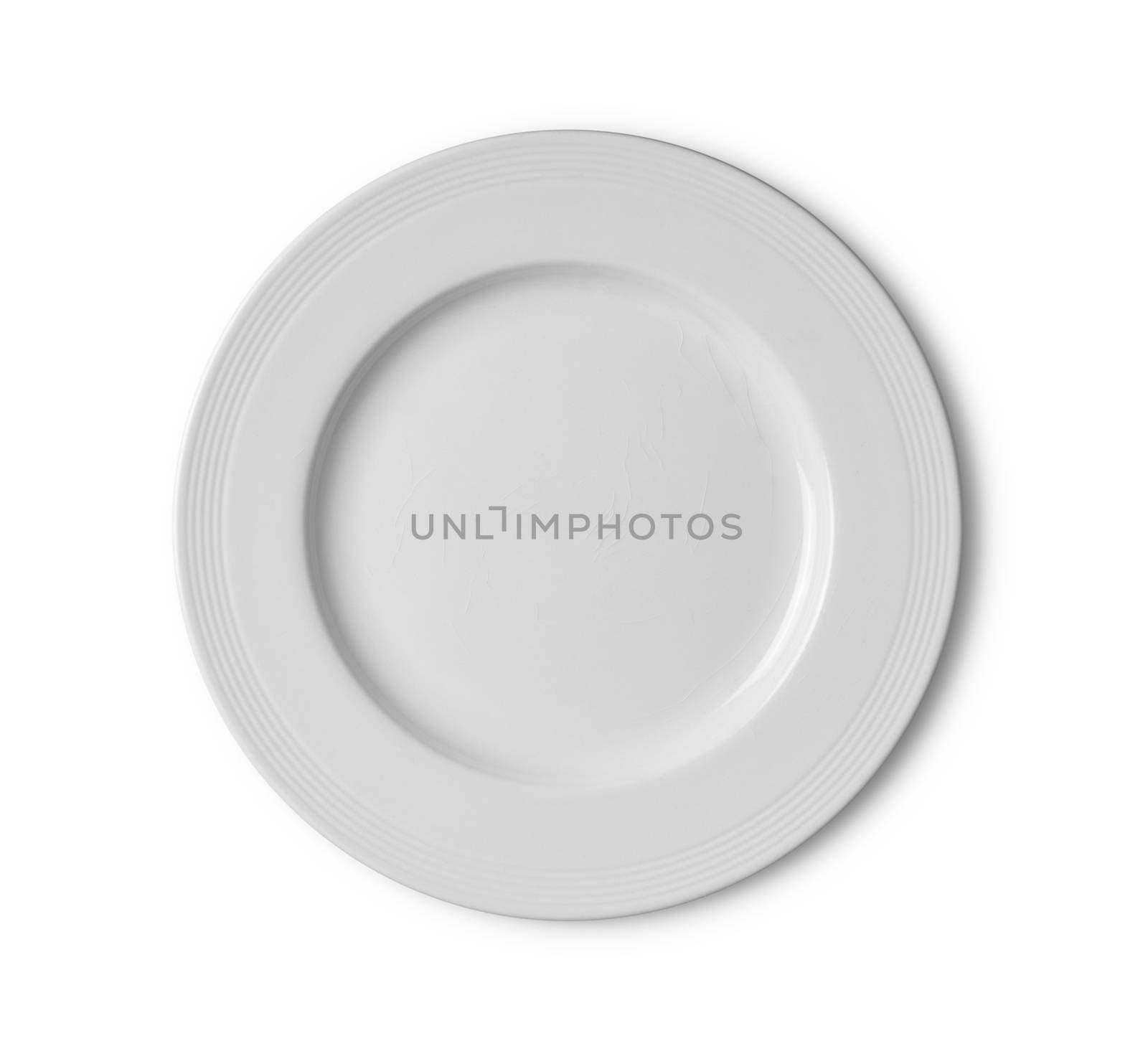 white ceramic plate on white background by sommai