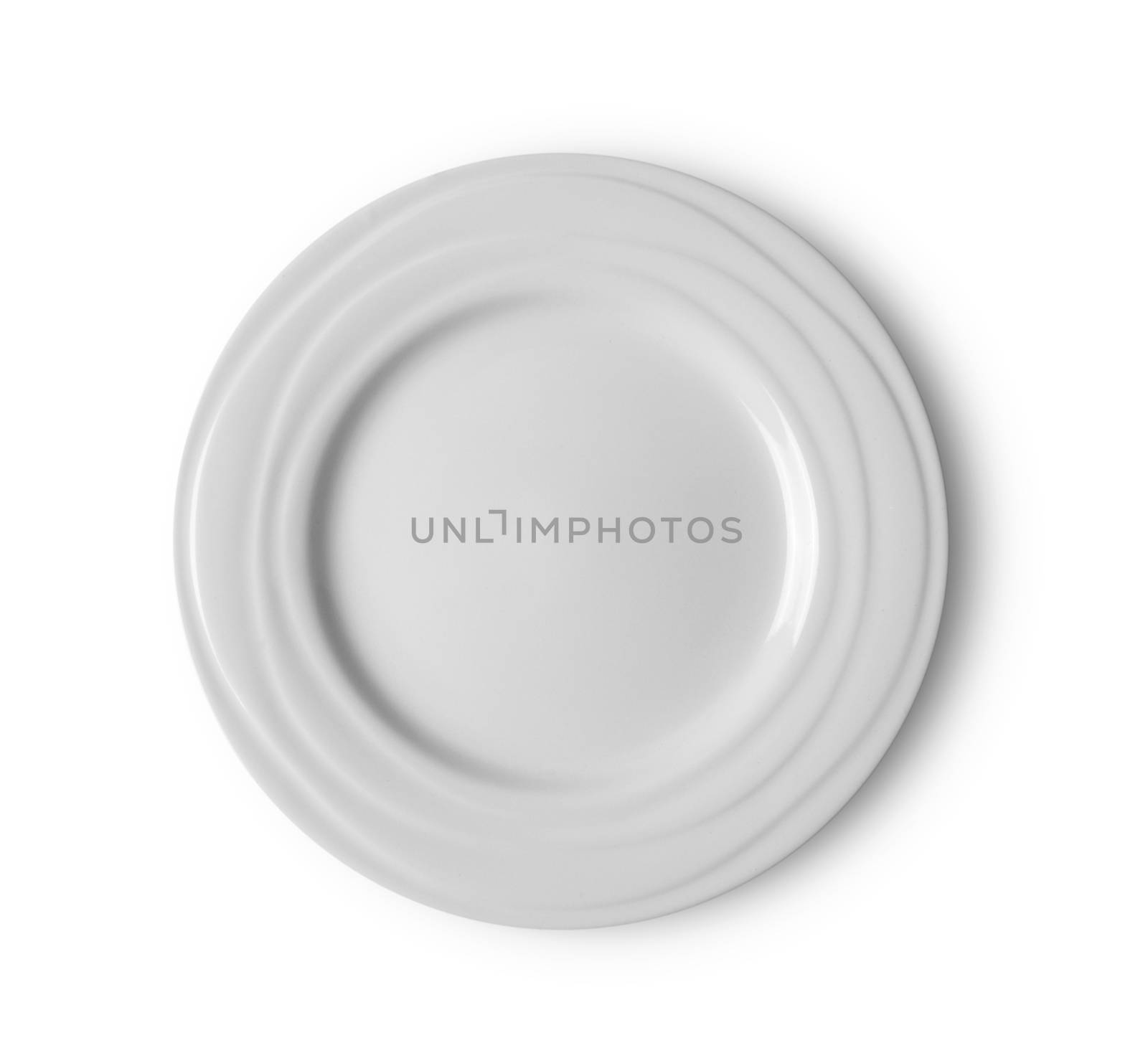 white plate on white background by sommai