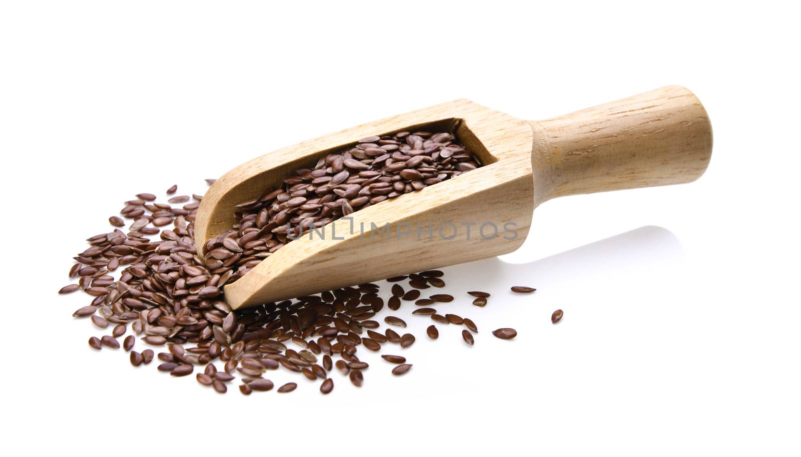 Flax seeds heap on white background by sommai