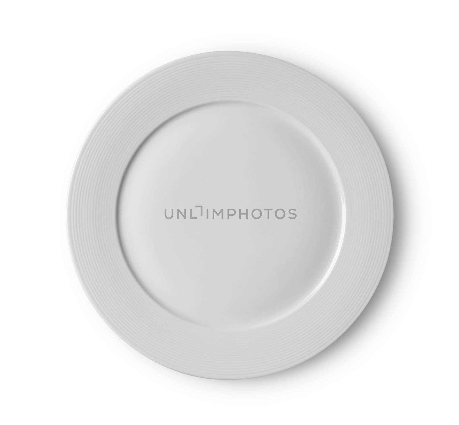 white plate on white background by sommai