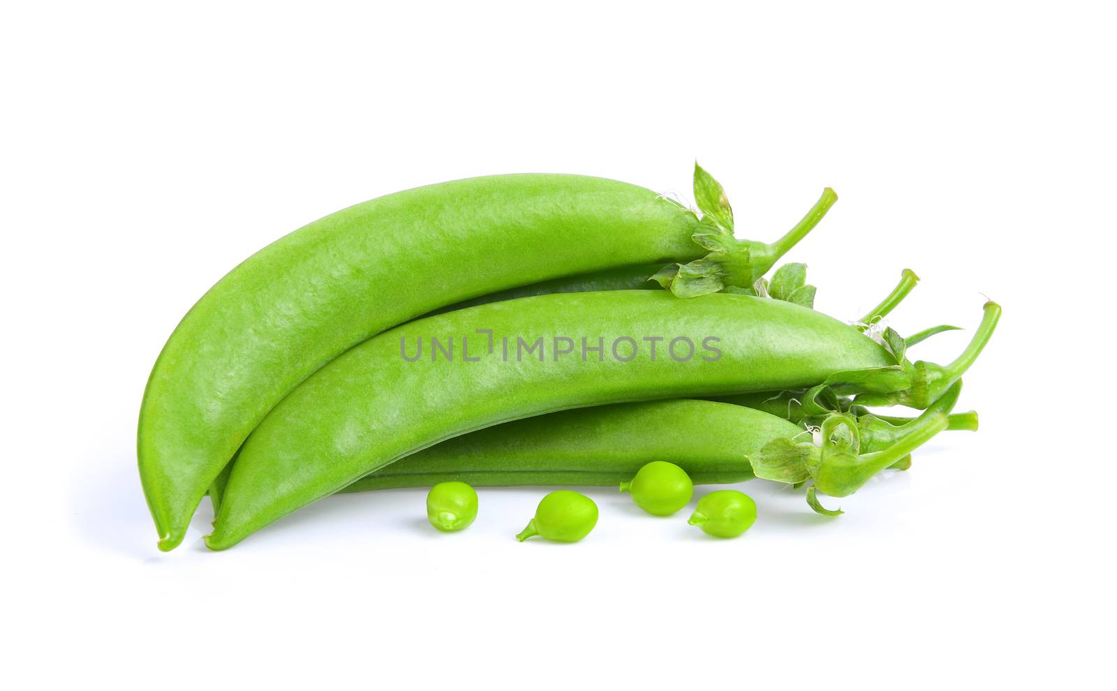 Green peas on white background