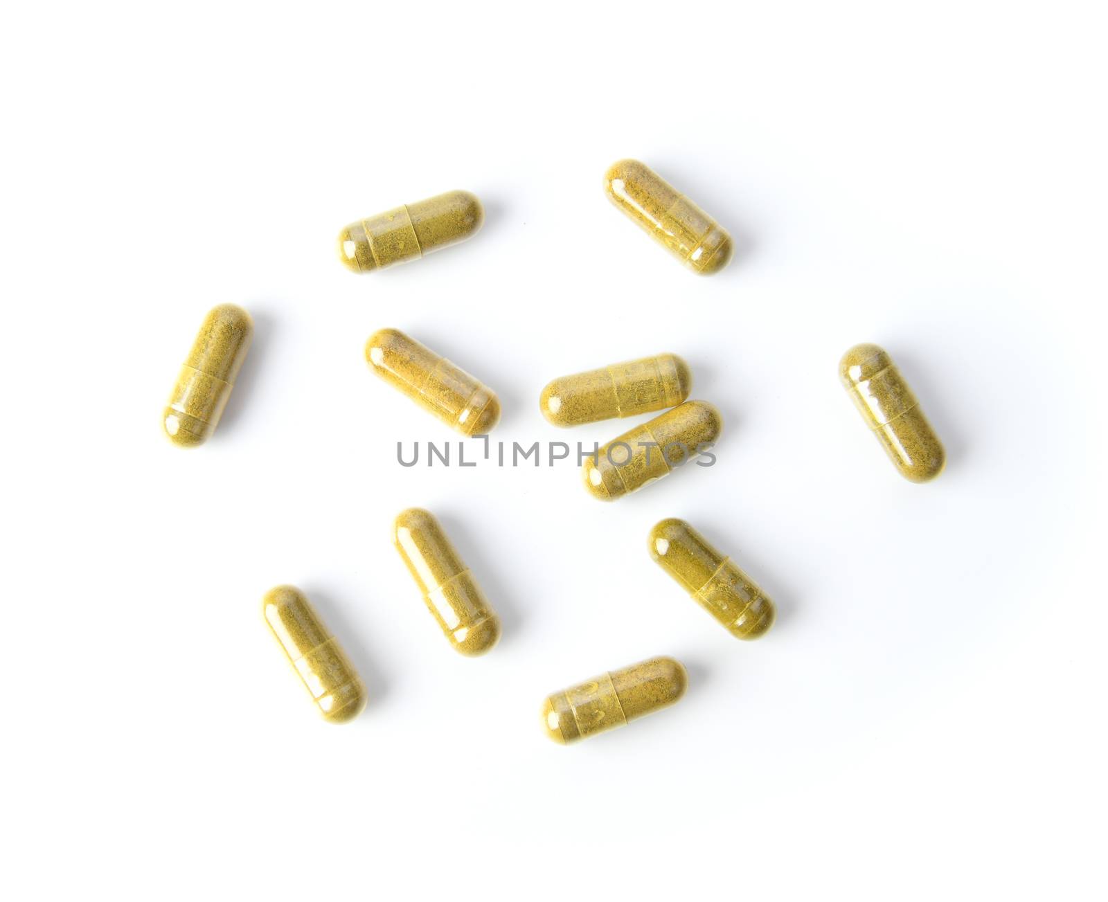 Herbal Capsules on white background by sommai