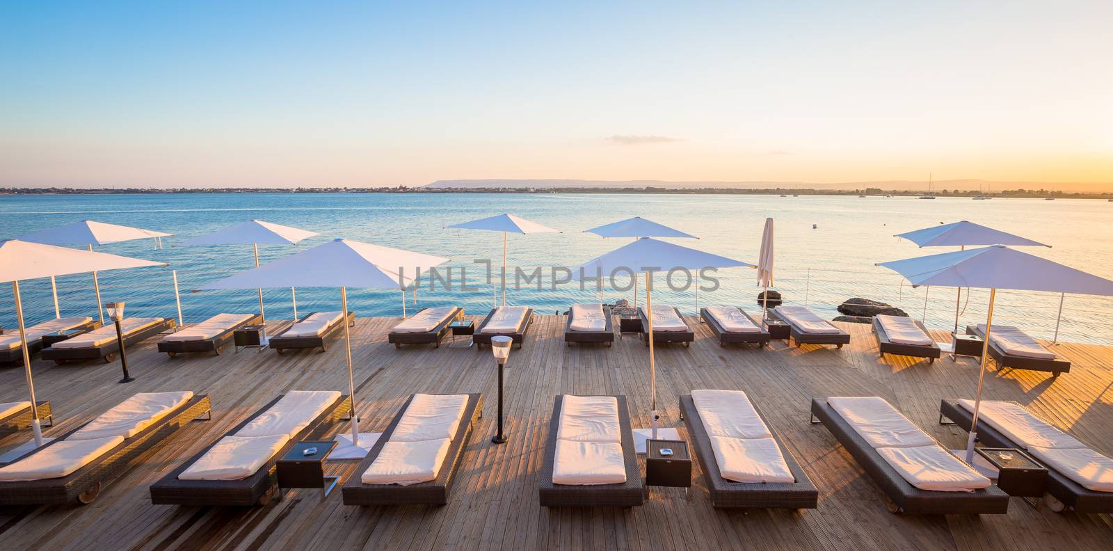 Syracuse, Isle of Sicily, Italy. Sunset in front of the sea at the end of a spring day in May.