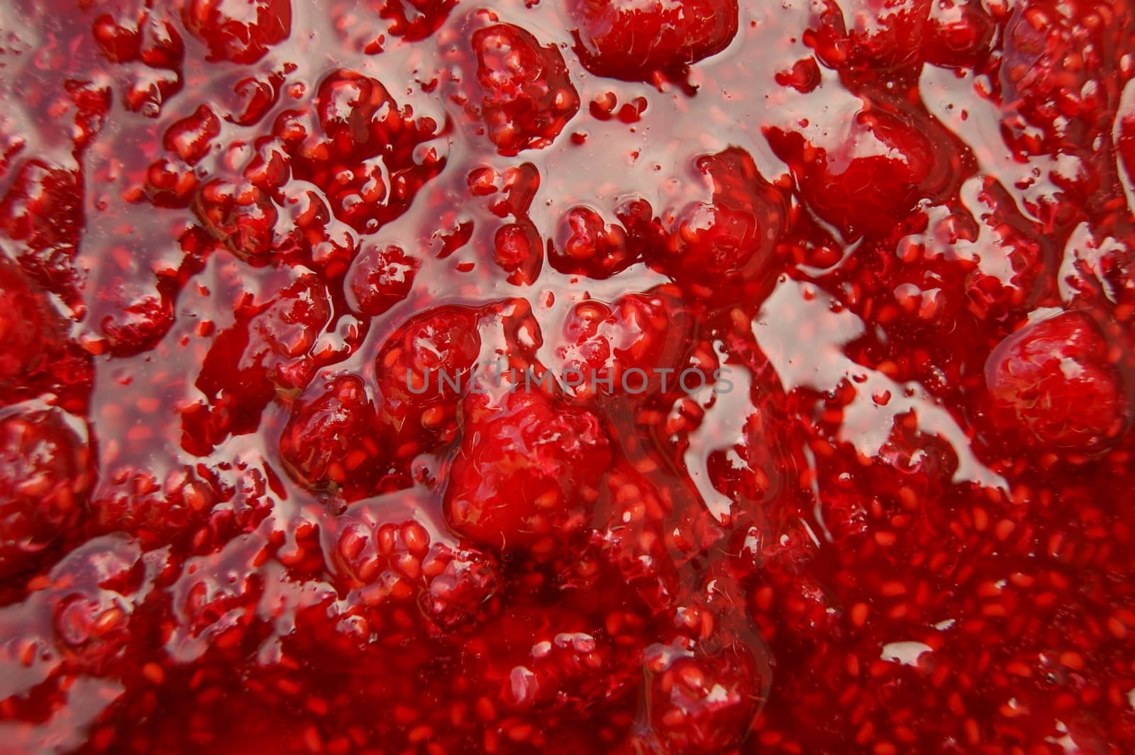 Fresh raspberry jam background by cobol1964