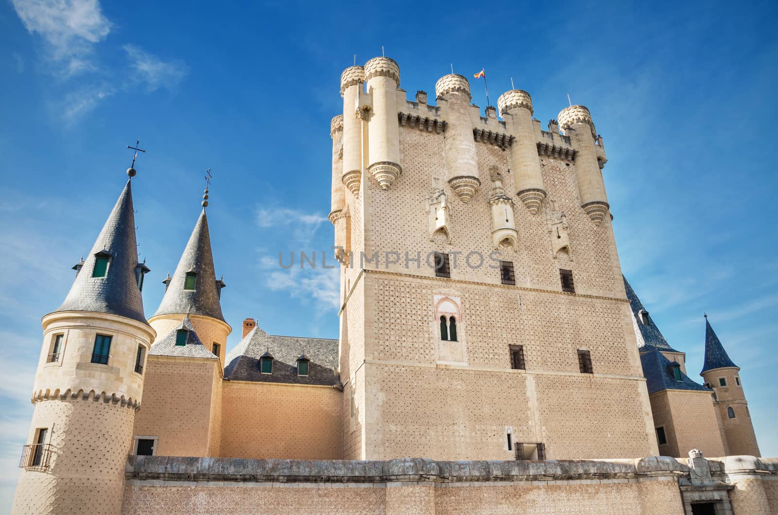 Facade of alcazar castle in Segovia, Spain. by HERRAEZ