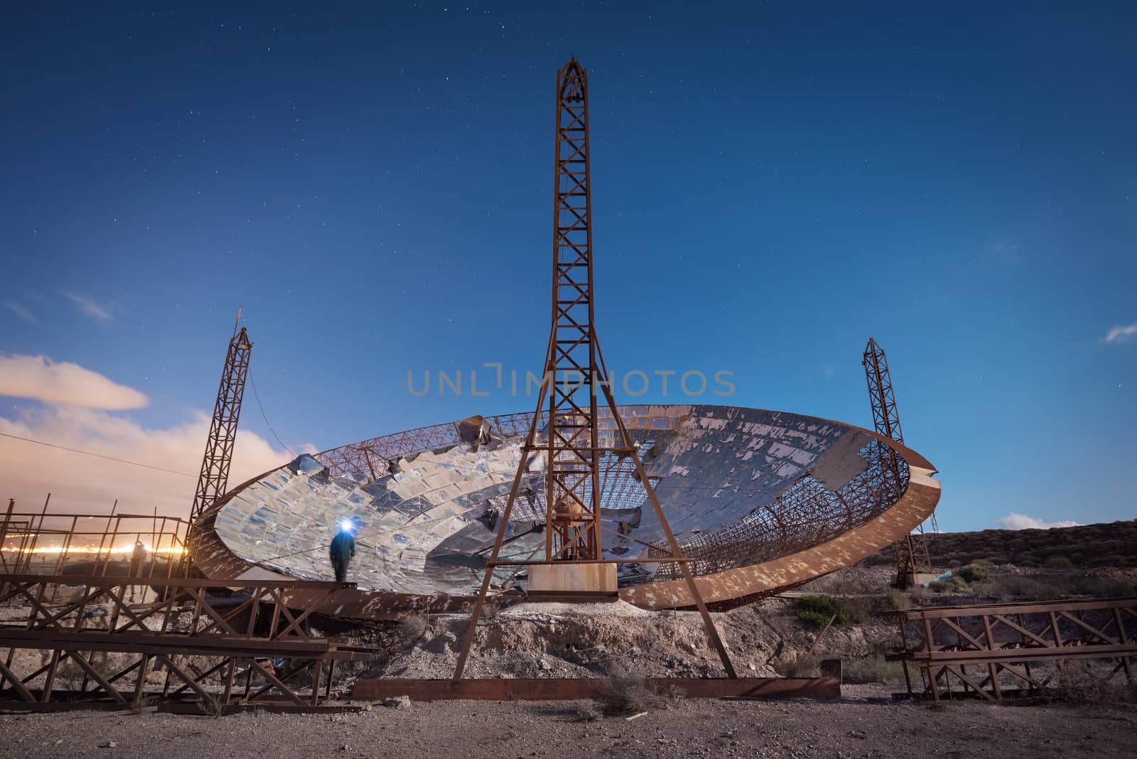 Night photography of a ruined setellite dish antenna in south Tenerife, Canary islands, Spain.