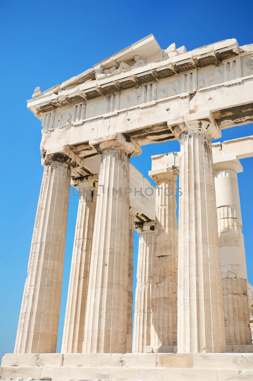 Detail of the columns in the famous Parthenon temple in the Acropolis, Athens, Greece. by HERRAEZ