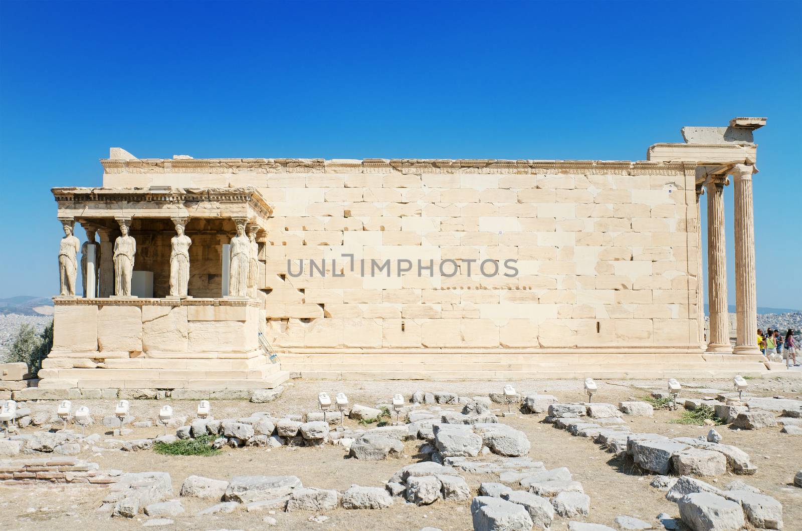 Famous cariathides temple in the Acropolis, Athens, Greece. by HERRAEZ
