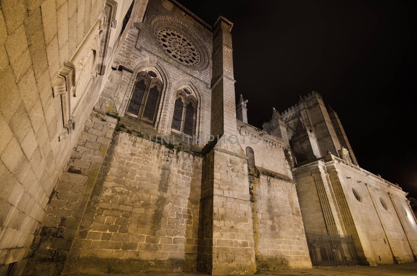 Night scene of famous Avila cathedral, Castilla y Leon, Spain. by HERRAEZ