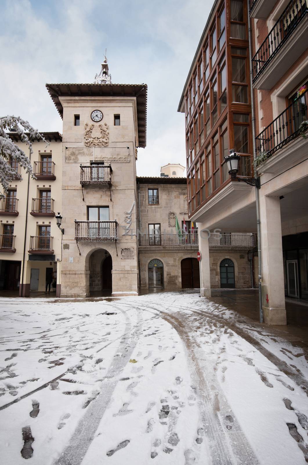 Winter scene of a snowed cityscape landscape of the ancient village of Briviesca in Burgos Province, Castilla y Leon, Spain. by HERRAEZ