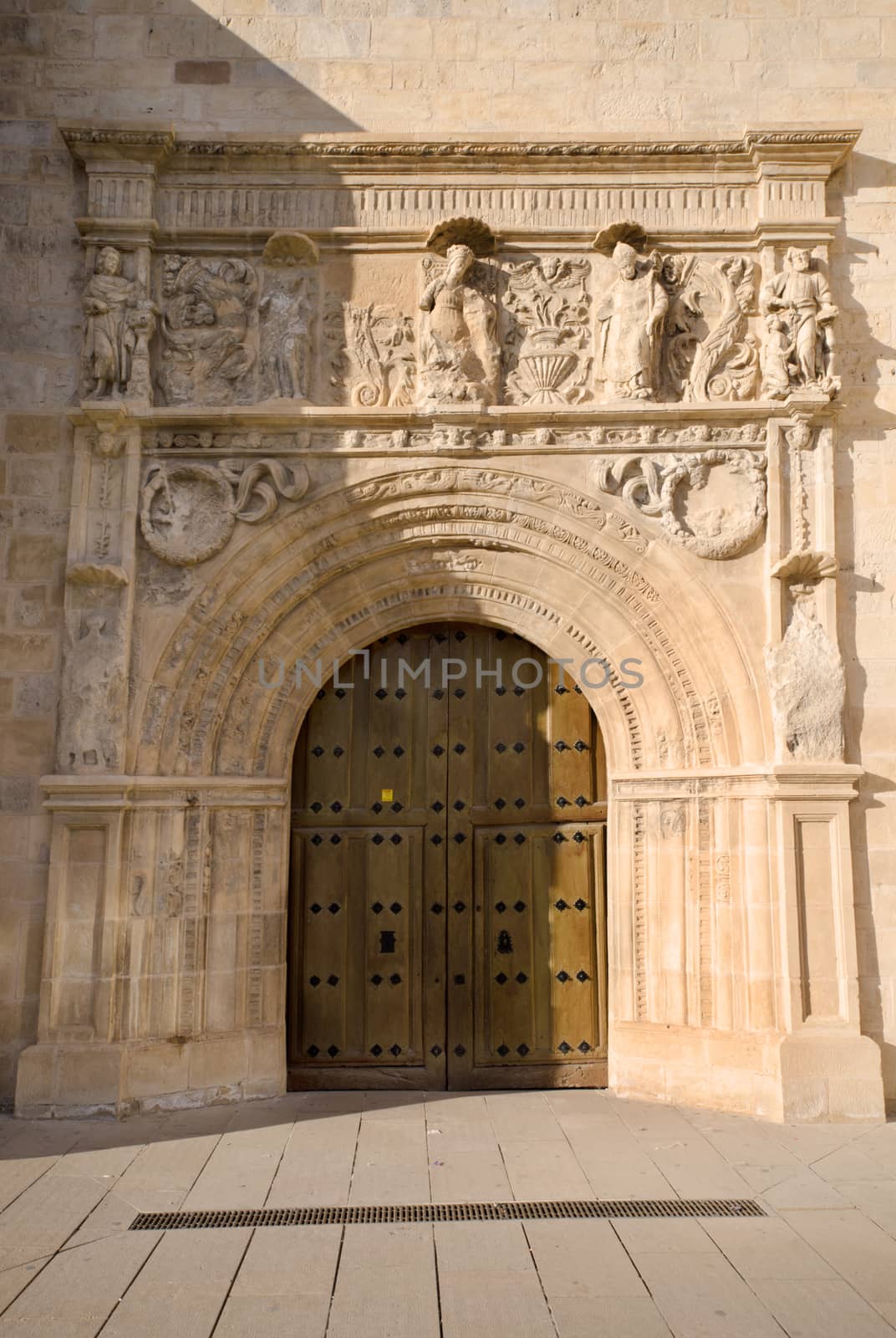 Church door and facade in the ancient village Briviesca, in Burgos province, castilla y Leon, Spain.
