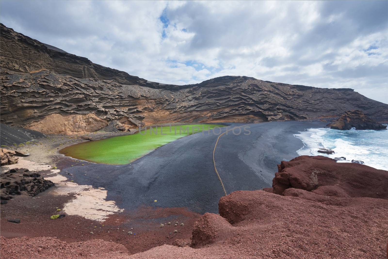 Volcanic green lake (El charco de los clicos) in Lanzarote, Canary islands, Spain. by HERRAEZ