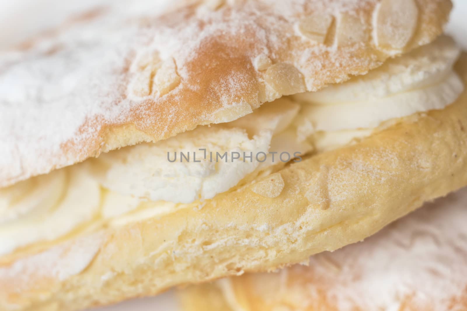 Delicious cream pastry macro picture, central selective focus. by HERRAEZ