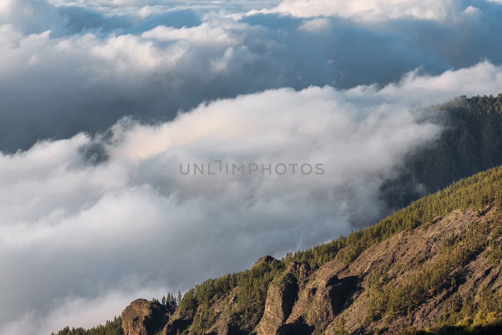 Sea of clouds in volcanic landscape of Teide national park, Tenerife, Canary islands, Spain.