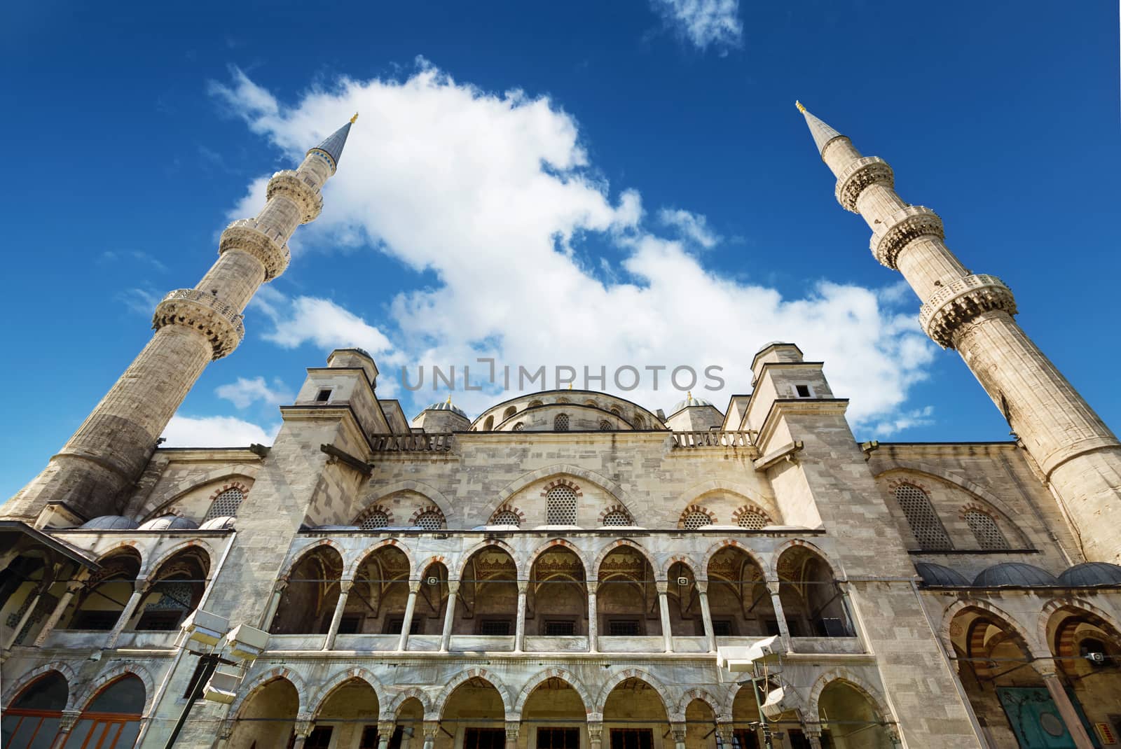 Scenic view of Istanbul famous landmark Blue Mosque over blue cloudy sky.