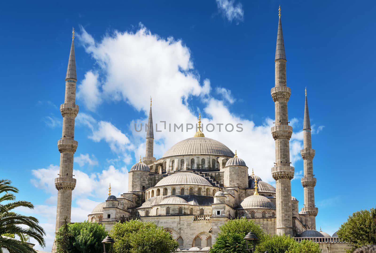 Scenic view of Istanbul famous landmark Blue Mosque over blue cloudy sky.