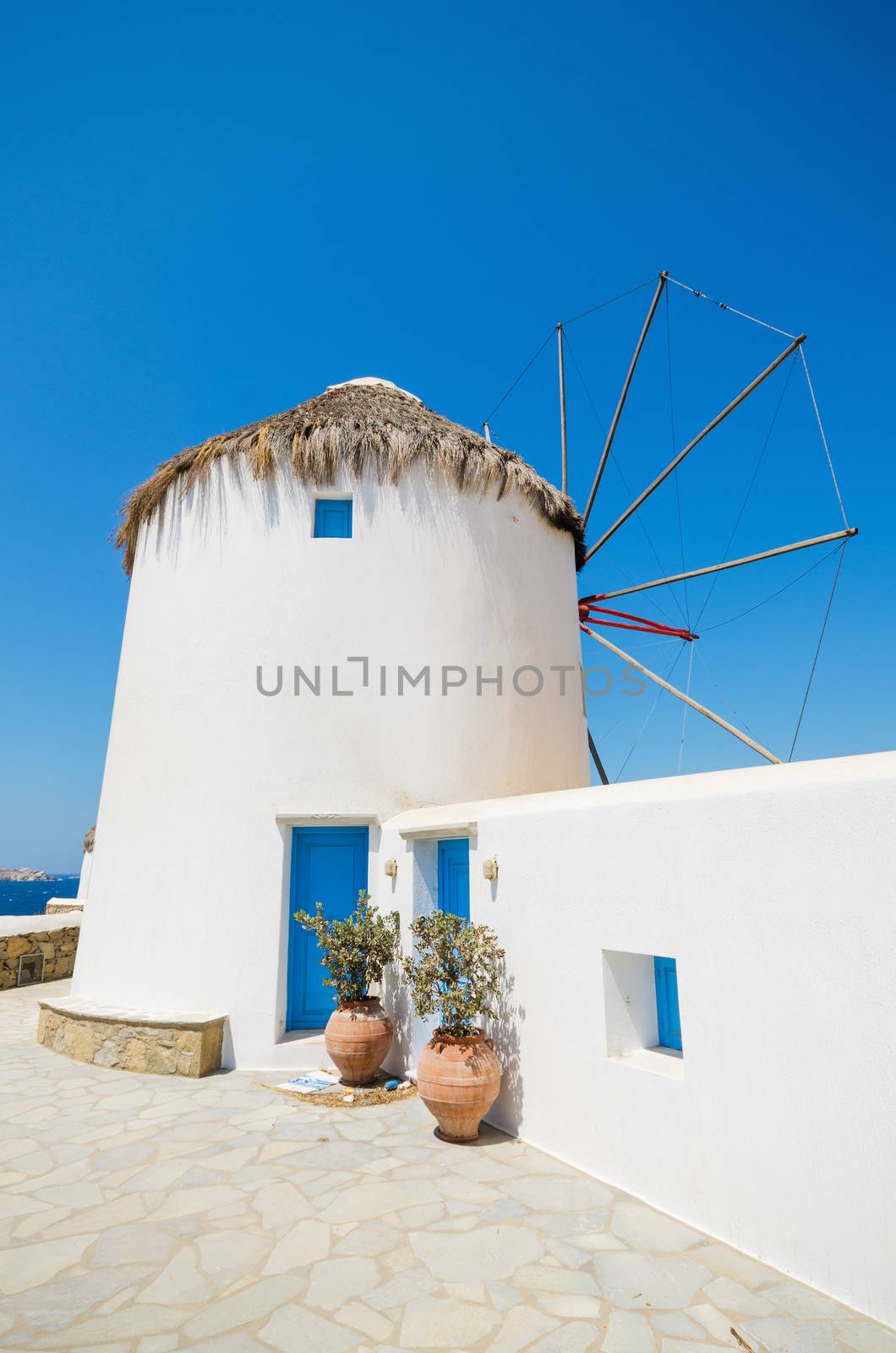 Famous windmill landmark, Mykonos, Greece.