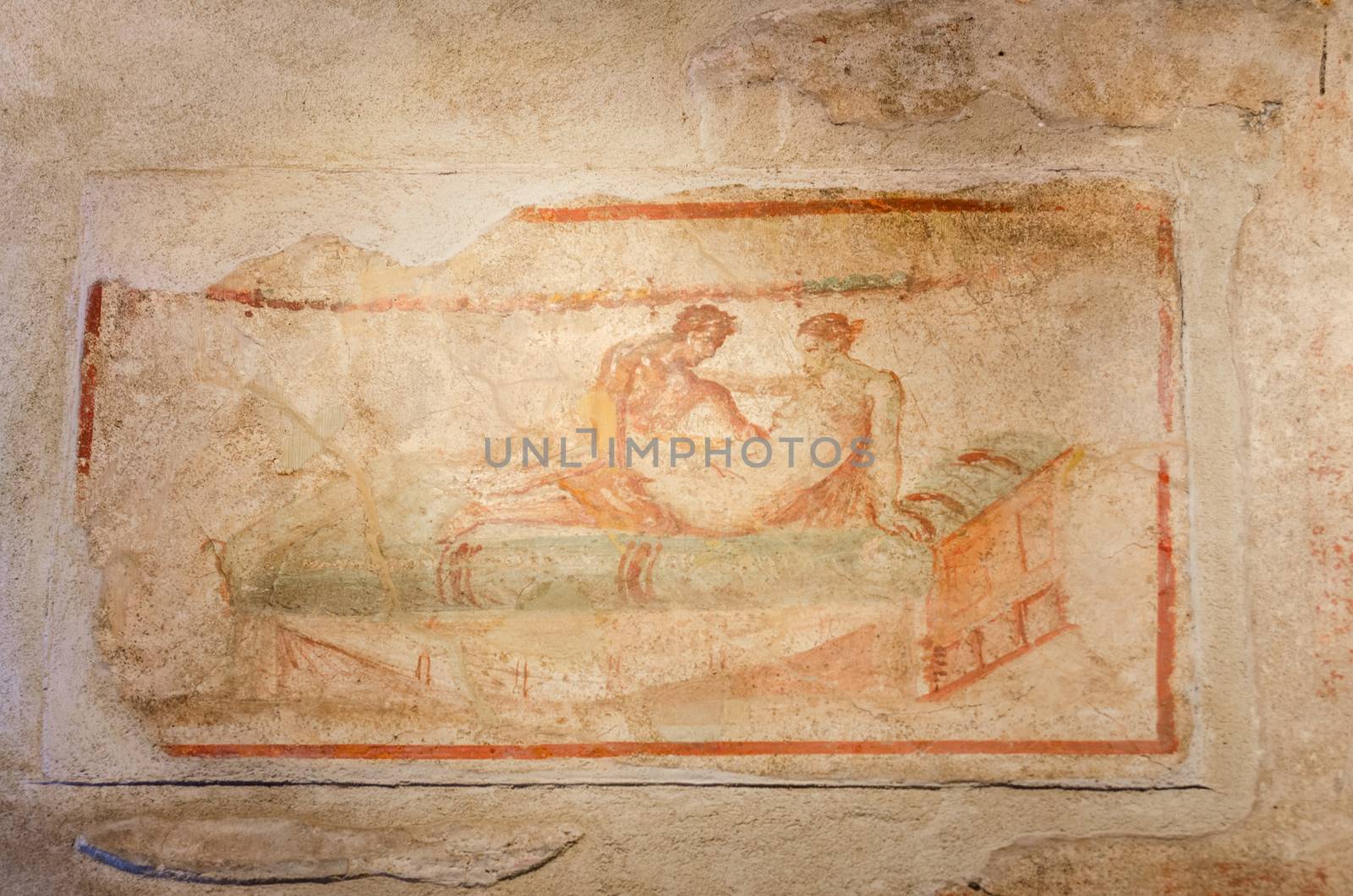 Ancient Roman fresco in Pompeii ruins, Italy.