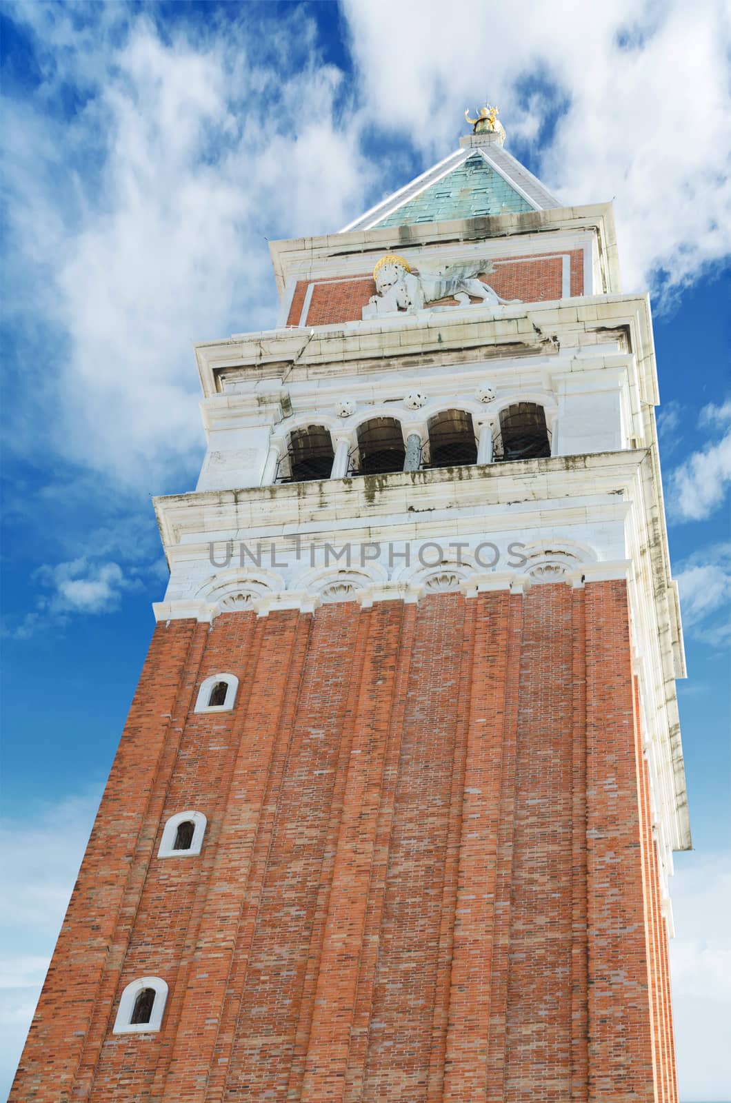 Venice famous landmark. St Mark's Campanile (Campanile di San Marco, ninth century) - famous bell tower of St Mark's Basilica, in st Marks square, Venice, Italy.