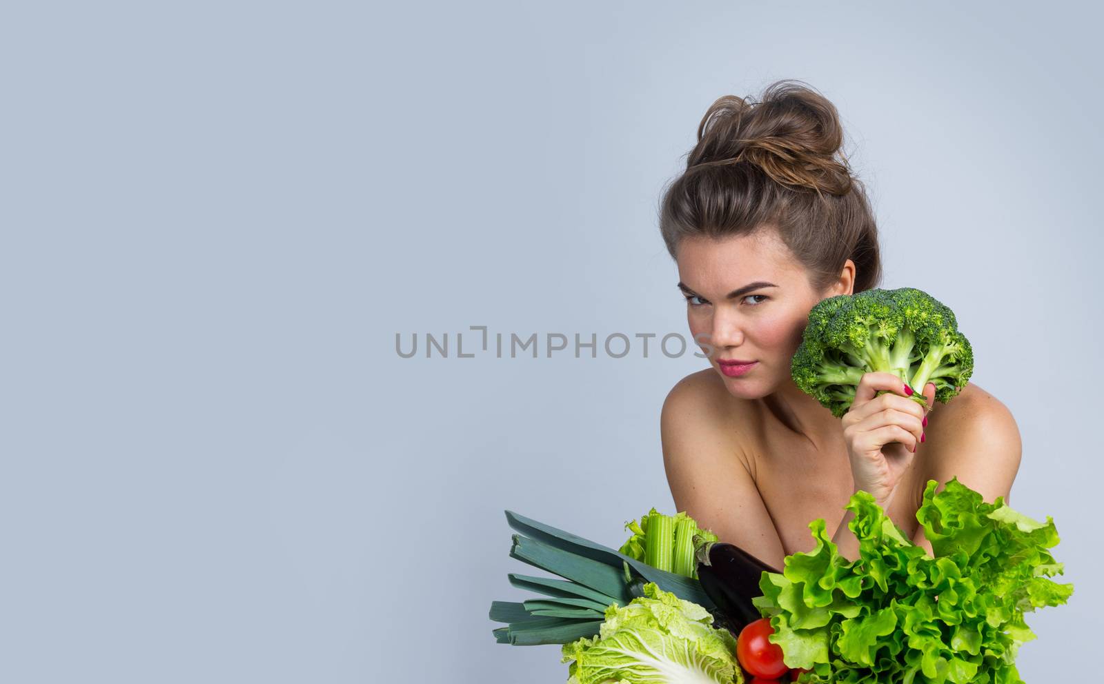 Young woman with vegetables by ALotOfPeople