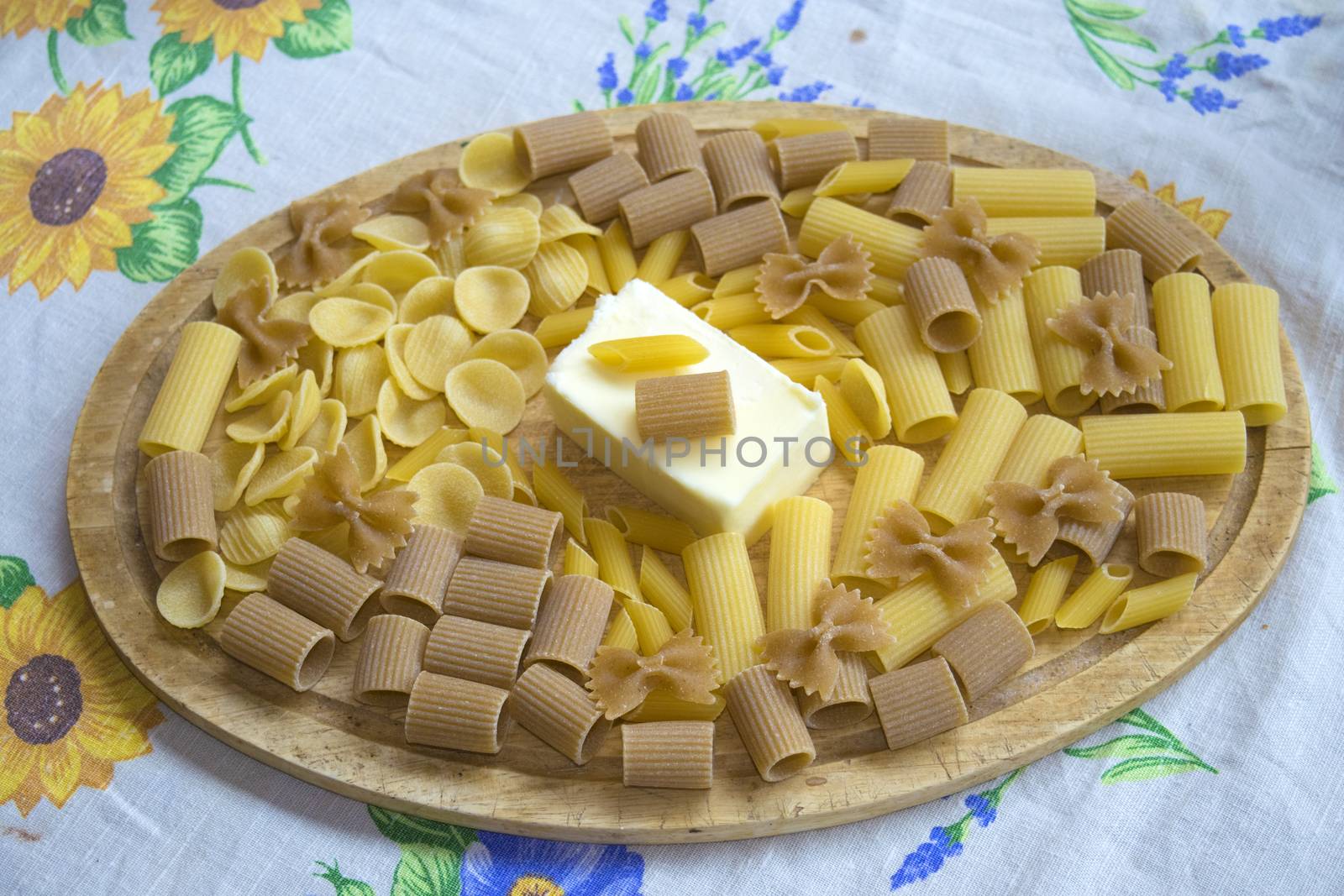  assorted wholemeal and normal raw pasta with a fresh butter