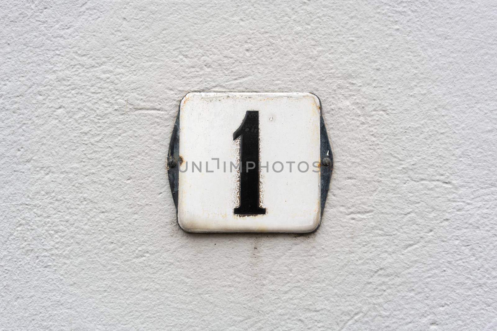 Enameled house number one (1)