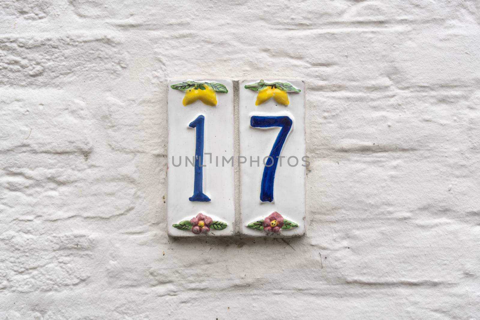 Ceramic house number seventeen (17)