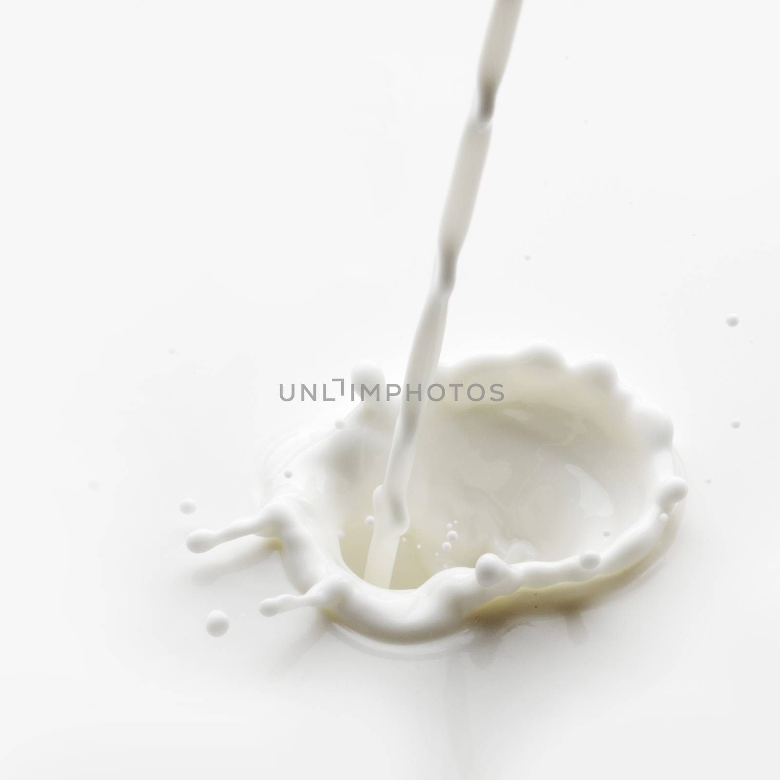 Pouring milk splash by Yellowj