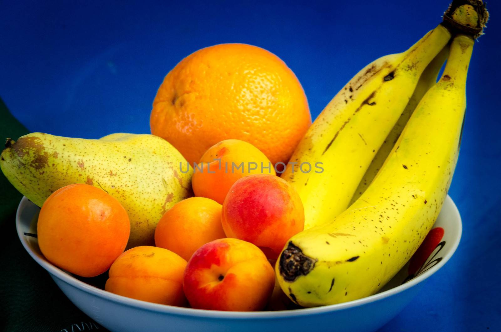 Bowl of tasty healthy healthy fruits, fresh summer fruit