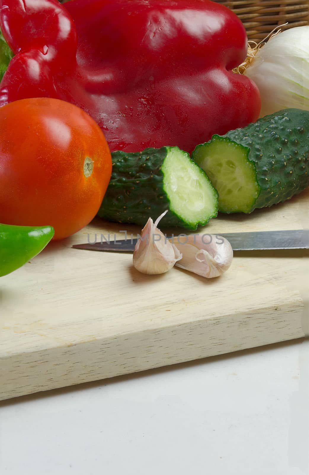 Gazpacho is a cold soup with ingredients such as olive oil, vinegar and raw vegetables: usually tomatoes, cucumbers, peppers, onions and garlic and bread. It is usually served fresh in the hot summer months.