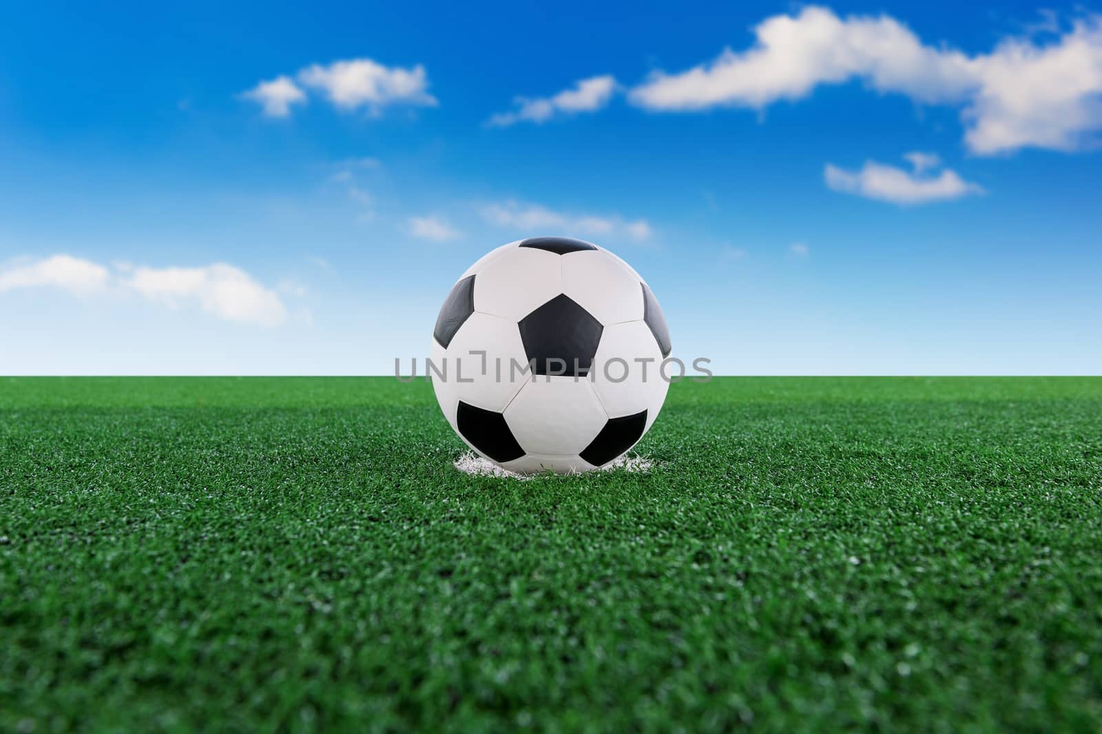 Soccer ball and soccer field. Football concept.