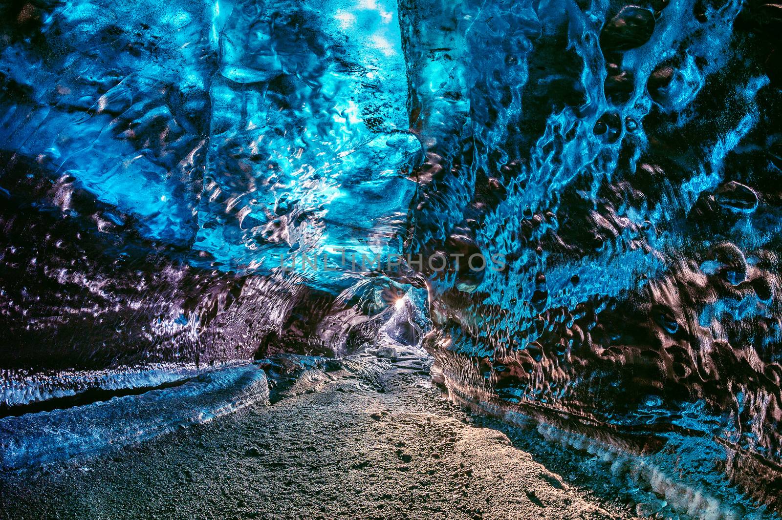 Ice cave inside glacier in Iceland. by gutarphotoghaphy
