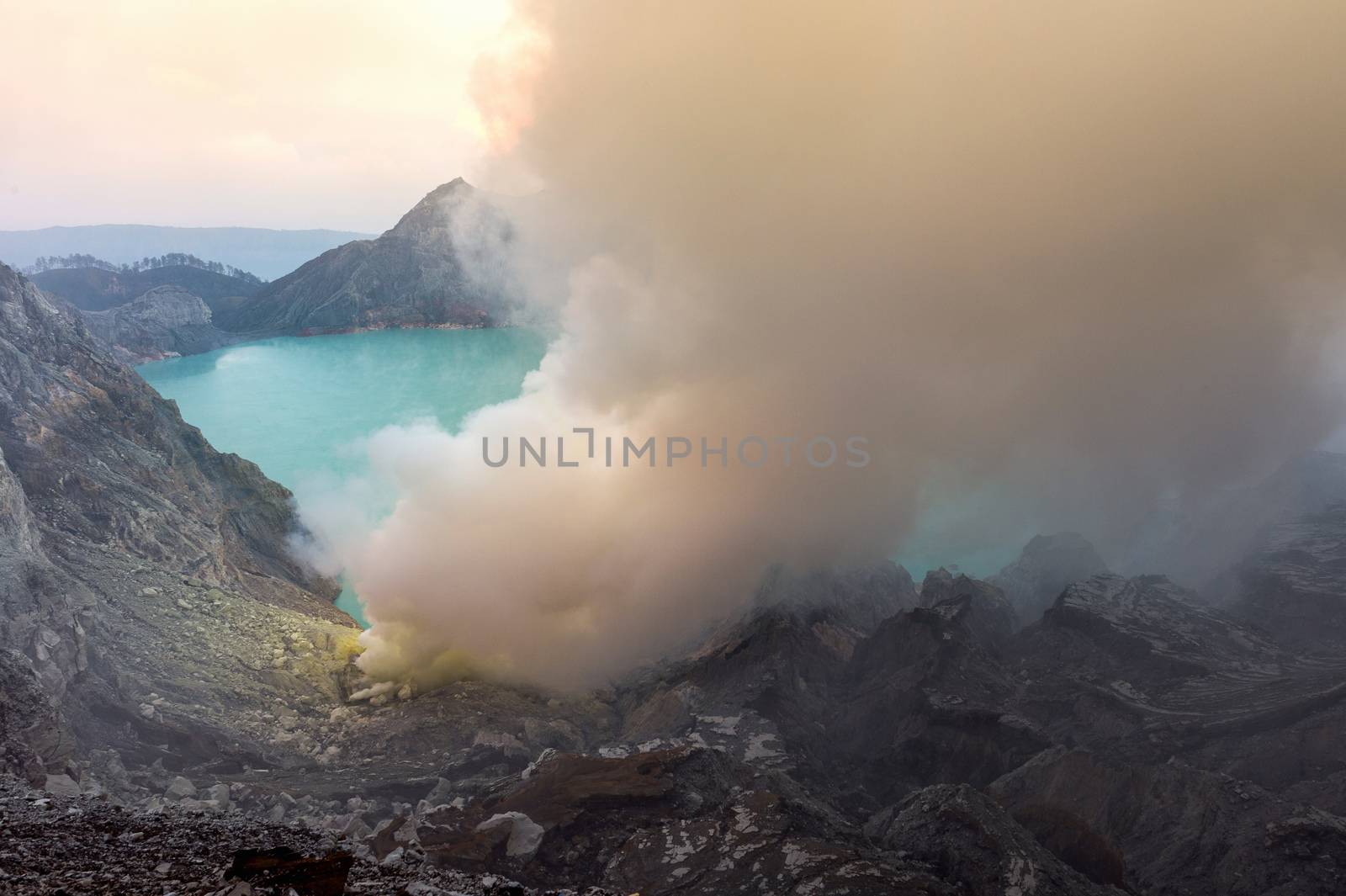 Sulfur fumes from the crater of Kawah Ijen Volcano in Indonesia by gutarphotoghaphy