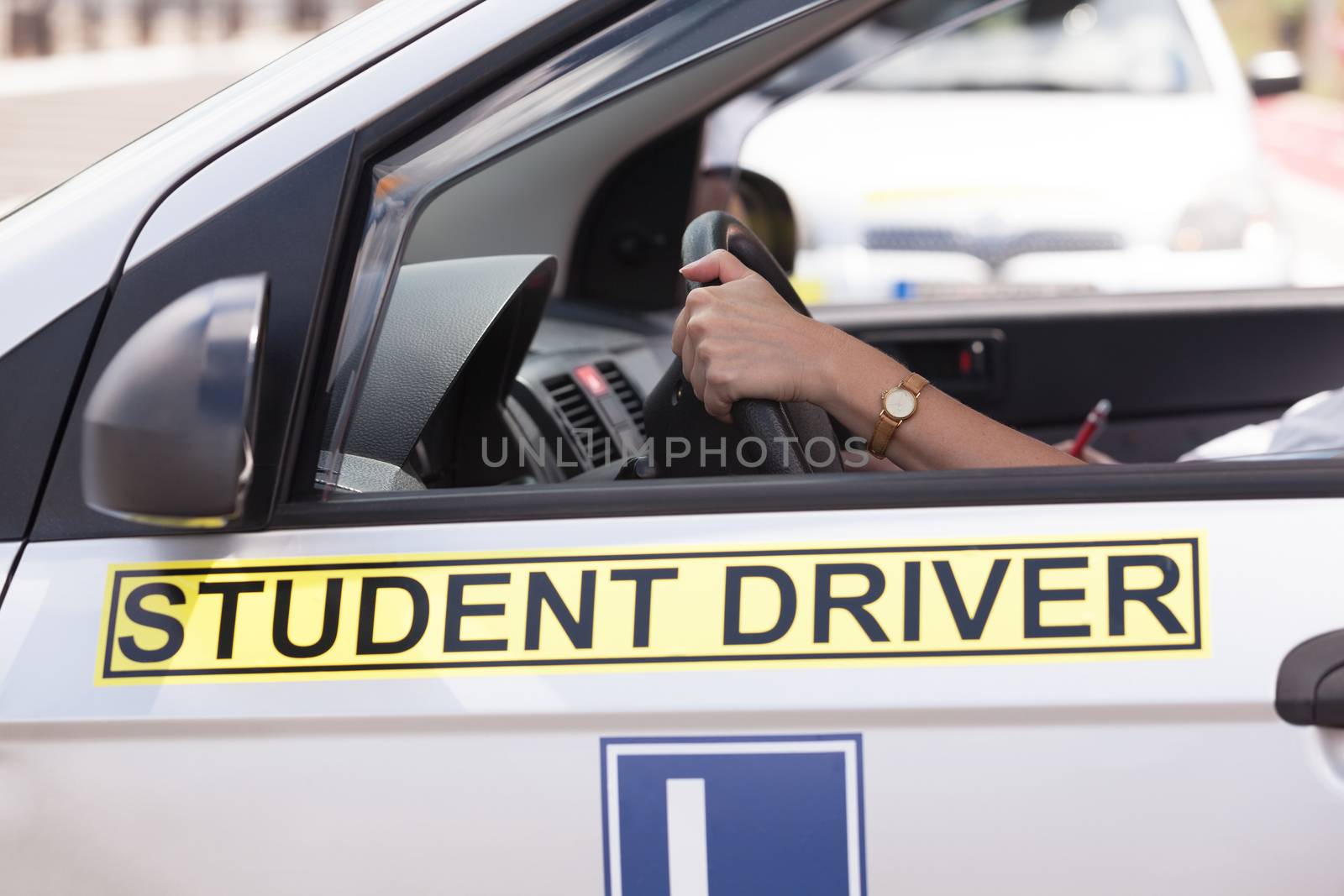 Driving education. Student driver. by wellphoto