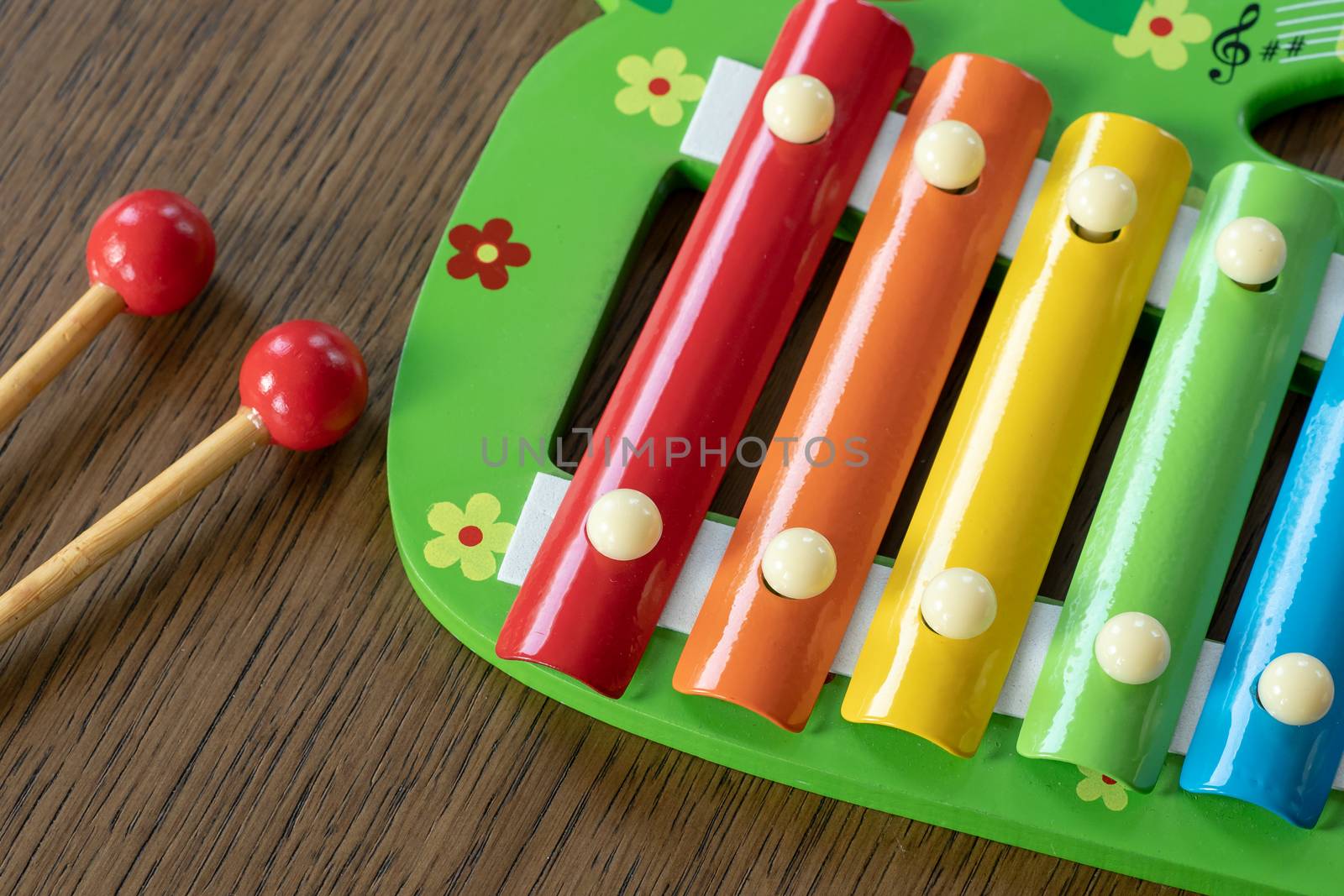 Musical instrument xylophone. Rainbow colored toy xylophone.