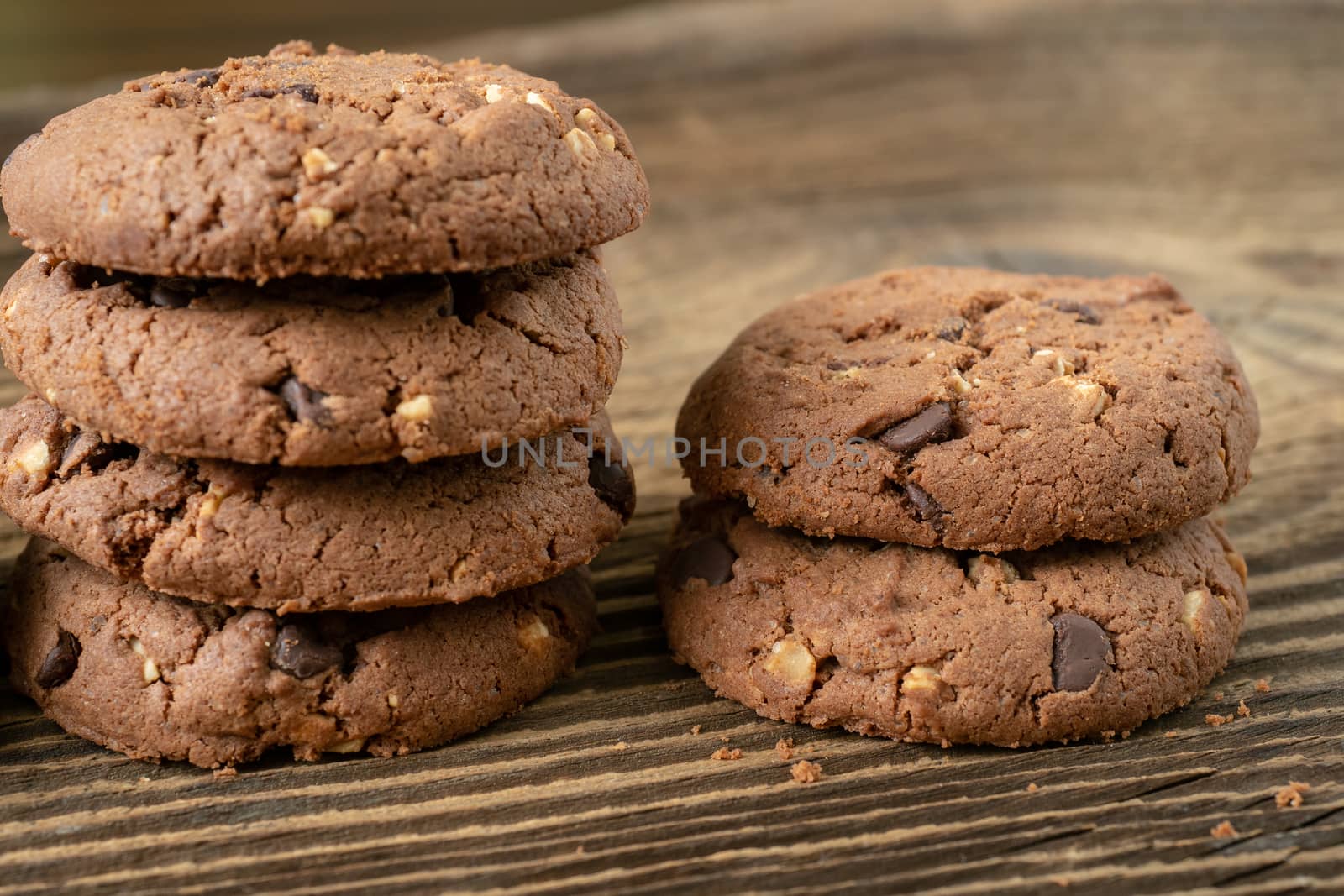 Various tasty cookies biscuits on wooden background