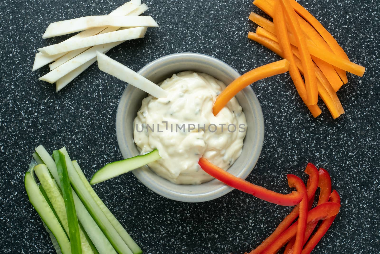 Vegetable sticks and dips in bowl. Healthy vegetables and dip snack.