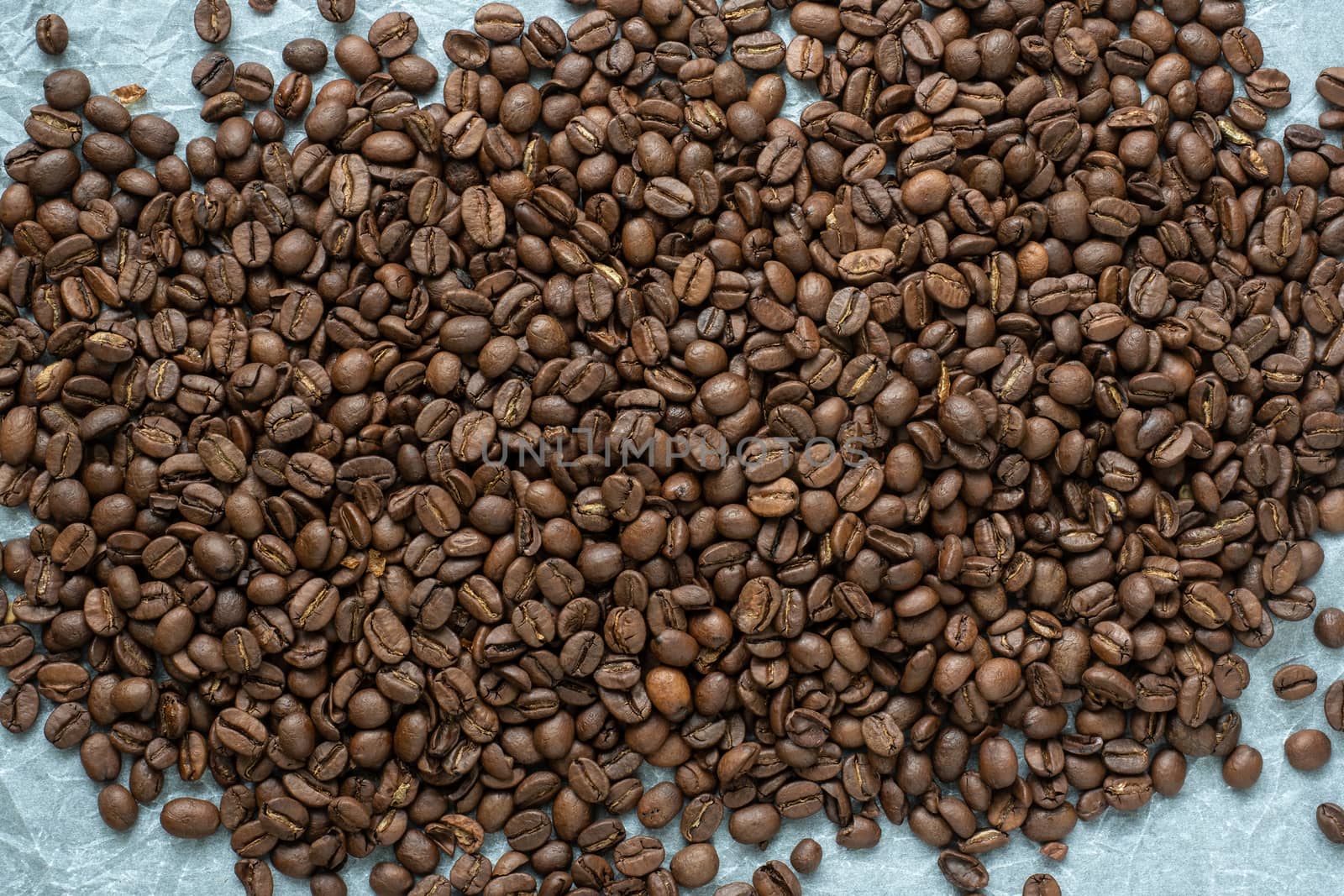 Coffee beans on crumpled paper