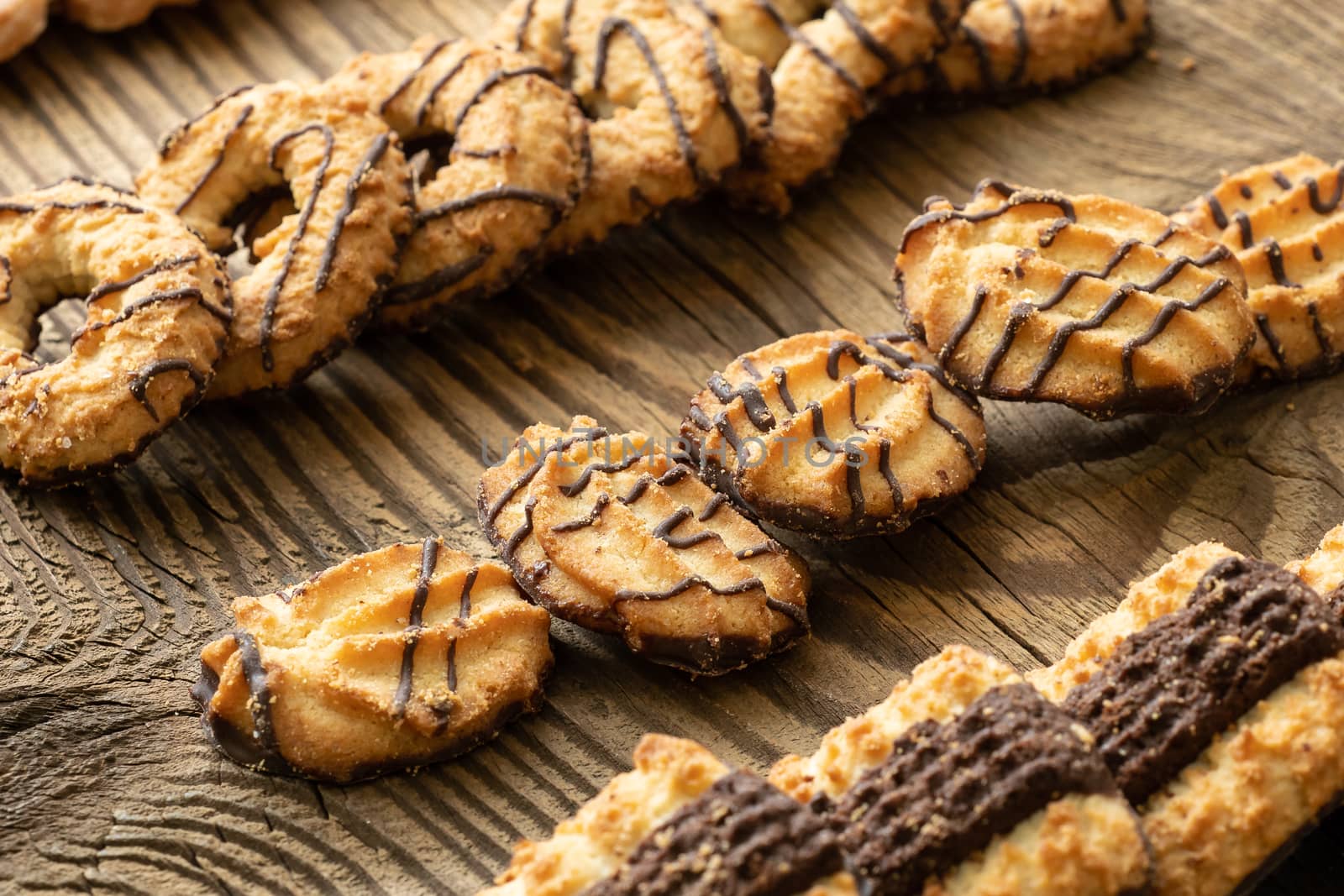 Various cookies on old wooden table