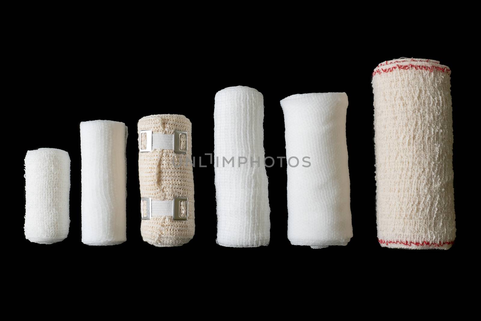 Different sizes of medical bandages. Medical bandages isolated o by xtrekx