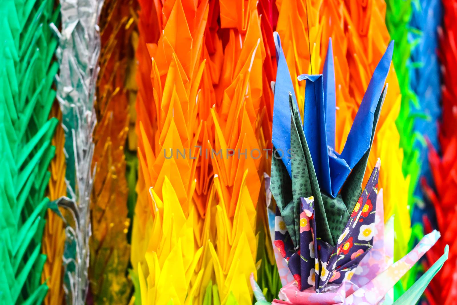A group of colorful origami birds, use as background