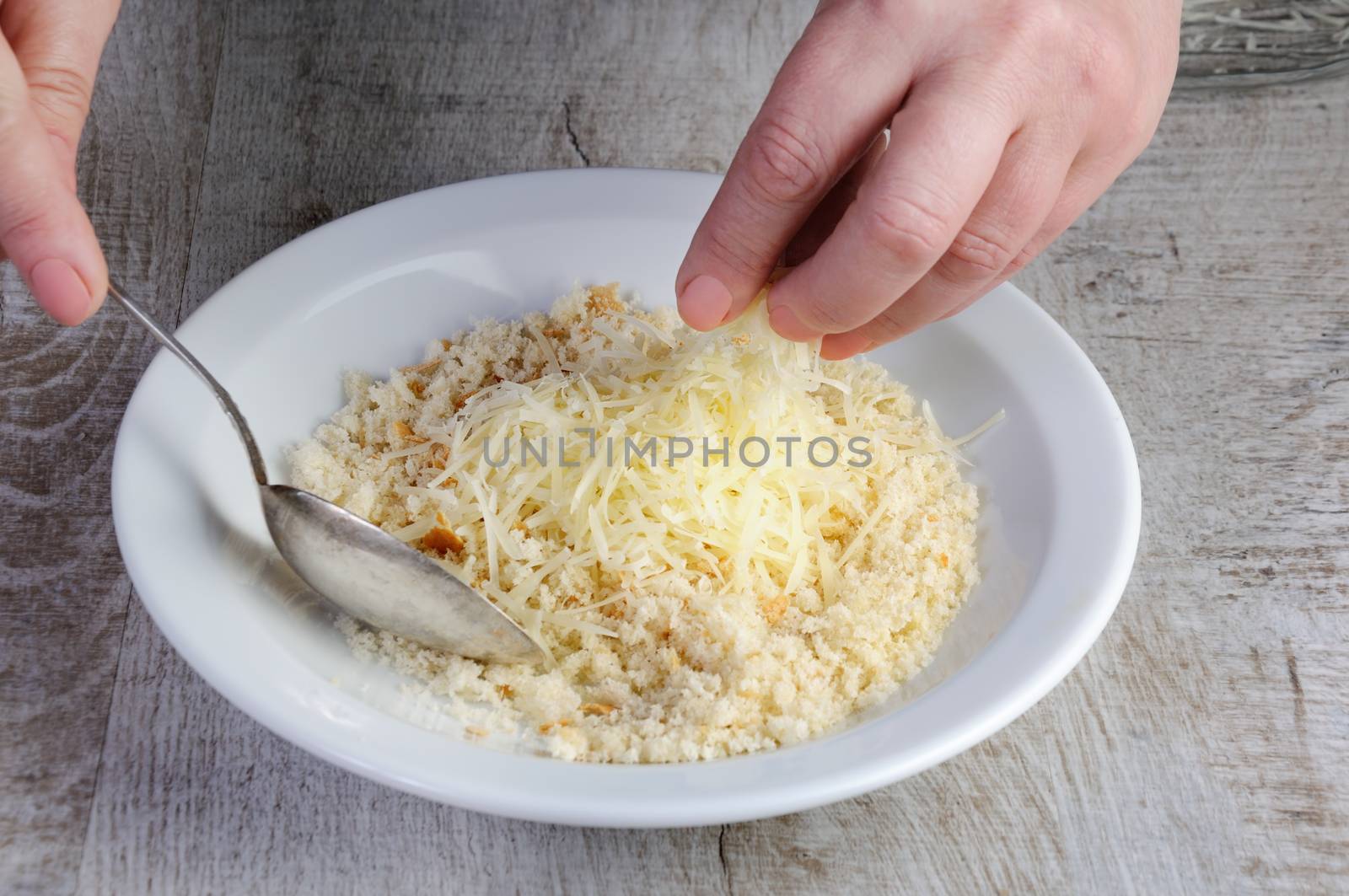   Cooking. Preparation of mixture for breading from bread crumbs and Parmesan. Step-by-step recipe. Stage preparation for cooking dishes. Series.